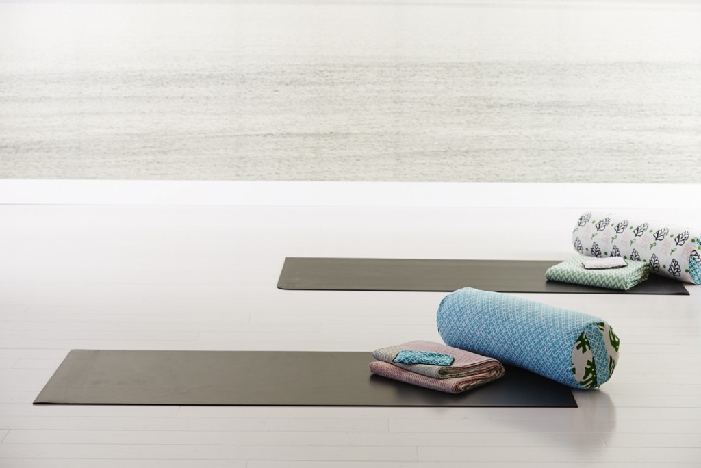 Yoga mats and boosters in peaceful studio